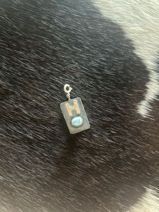 H Charm